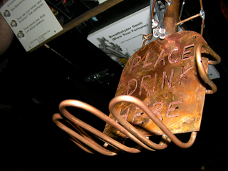 Illustration for article titled Shot-Glass Printing Bot, Darko-Like Rabbit, Molten Beer Bong Turn Up at Roboexotica "Cocktail Robotics" Convention